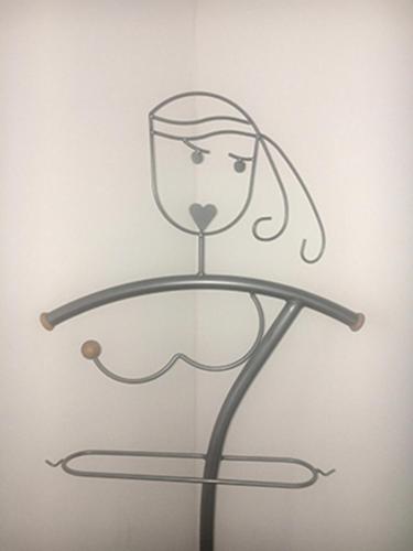 a drawing of a woman on a table at Ferienwohnung Kronegarten in Gmunden