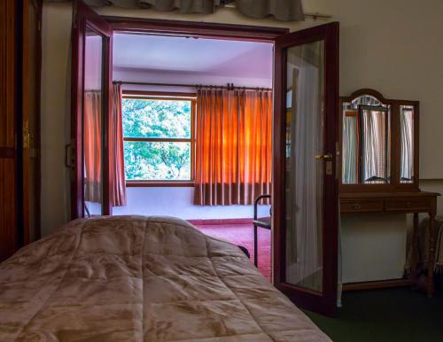 Ένα ή περισσότερα κρεβάτια σε δωμάτιο στο Casa Miranda