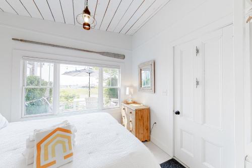 Ένα ή περισσότερα κρεβάτια σε δωμάτιο στο Long Point Getaway
