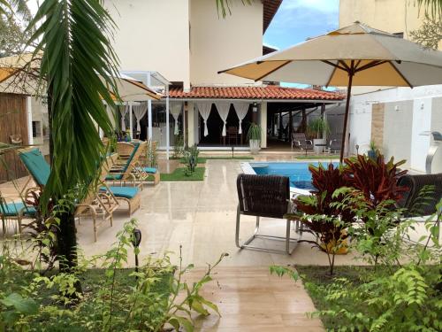 Taman di luar Pousada Villa Encantada LGBTQIAPlus