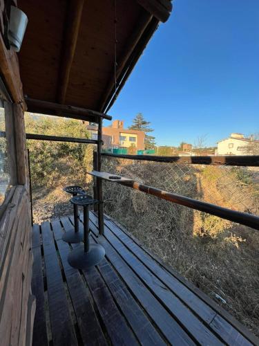 Balkoni atau teres di Cabaña La Triada Pileta Privada Grupo Cabaña La Triada
