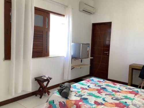 Katil atau katil-katil dalam bilik di Pousada Villa Encantada LGBTQIAPlus