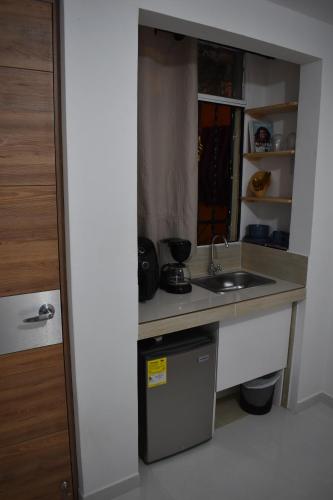 Virtuve vai virtuves zona naktsmītnē Casa Bougainvillea