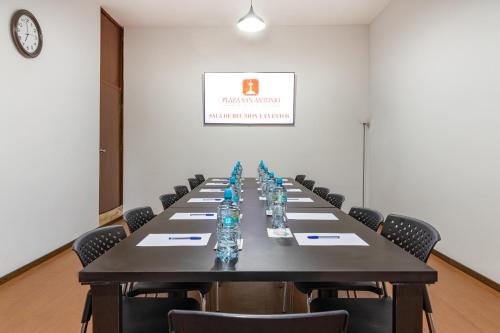 a large conference room with a long table with chairs at Hotel Plaza San Antonio Arequipa in Arequipa