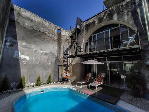 Bazén v ubytování Casa con alberca dentro de ex-hacienda en Atlixco nebo v jeho okolí