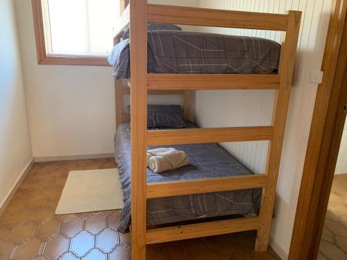 Postel nebo postele na pokoji v ubytování Quaint Hideaway
