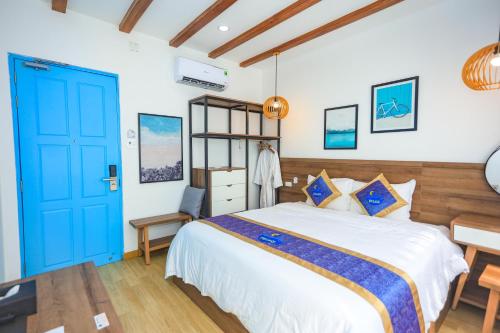 Ένα ή περισσότερα κρεβάτια σε δωμάτιο στο Chai Village Hotel