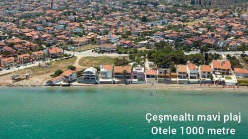 an aerial view of a beach with houses at Hotel Barba in Urla