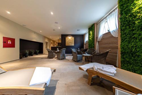 Un lugar para sentarse en Wellness Hotel Pivovar Monopol