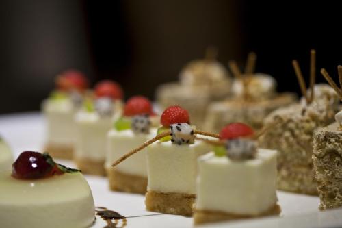 a bunch of dessert items on a table at Lakeshore Banani in Dhaka