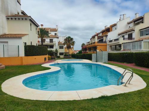 Bazén v ubytovaní Encartador Apartamento para Descanso Vacacional alebo v jeho blízkosti