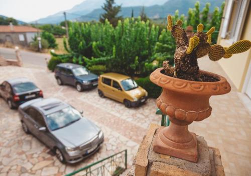 a model of a city with cars parked on a street at Villa “Alexis&Coco” traditional house in Tríkorfon