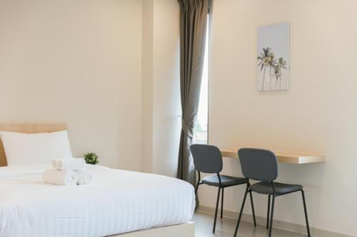 Postel nebo postele na pokoji v ubytování Good nine Hotel