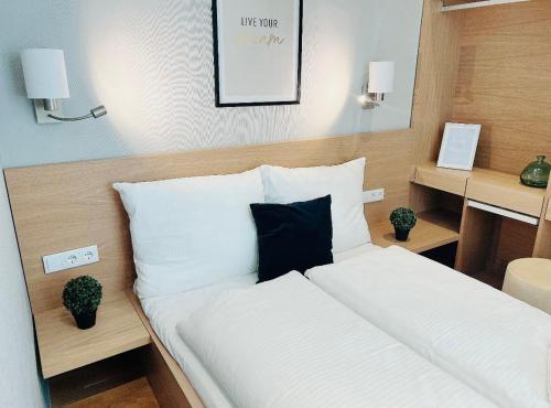 Posteľ alebo postele v izbe v ubytovaní ZEUS Design Apartment Erlach #62