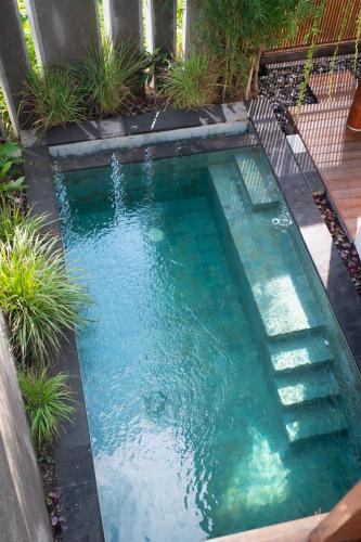 Tegal Sari Accommodation Ubudの敷地内または近くにあるプール