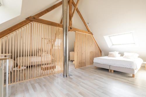 Кровать или кровати в номере Gîte Athois la campagne