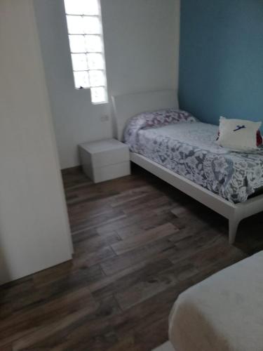 Postel nebo postele na pokoji v ubytování Cascina Anita