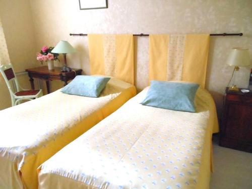 Postel nebo postele na pokoji v ubytování Au Soleil d'Albi