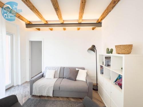 A bed or beds in a room at Basovizza 3 Chanel Tirabora Short Rent