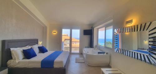 Ένα ή περισσότερα κρεβάτια σε δωμάτιο στο Imperial Rooms Tropea