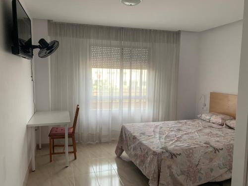 Ένα ή περισσότερα κρεβάτια σε δωμάτιο στο CA LAU