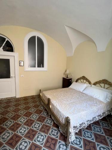 Postel nebo postele na pokoji v ubytování B&B Palazzo Lombardi