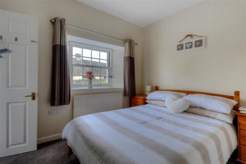 Voodi või voodid majutusasutuse 1 New Inn Corner toas