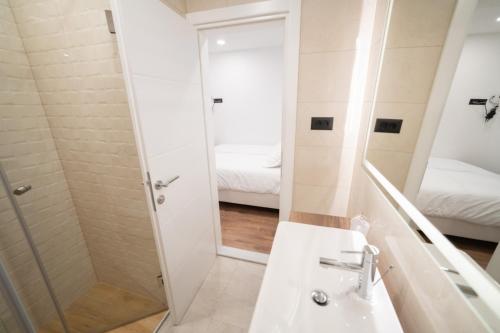 a bathroom with a shower and a sink at Luxury Apartments Una Sarajevo in Sarajevo