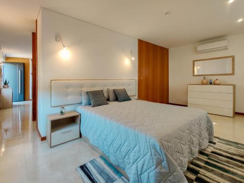 Ένα ή περισσότερα κρεβάτια σε δωμάτιο στο Casa do Casal - Country House with Swimming Pool