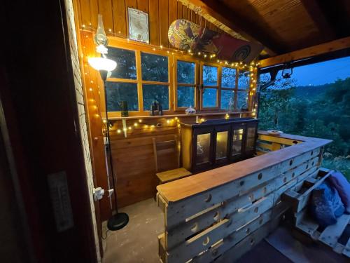 a room with a large window with lights on it at Kokin Brod Apartments in Kokin Brod