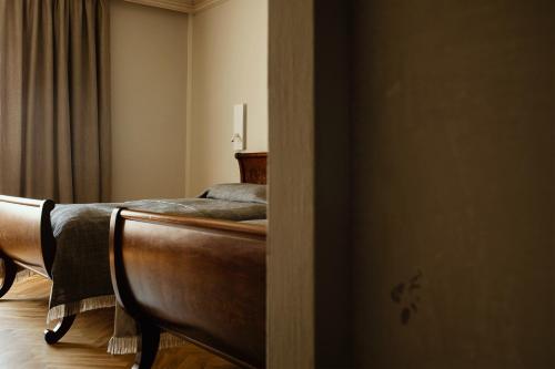 a bedroom with a bed in a room at Hotel Pod Różą in Kraków