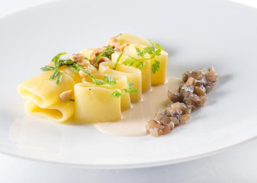 a plate of food on a white plate at Relais Blu in Massa Lubrense
