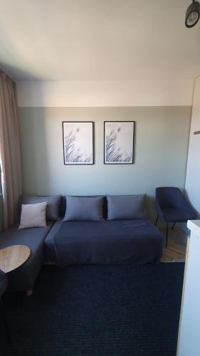 Posedenie v ubytovaní Apartamenty w Kamienicy - centrum, bezpłatny parking