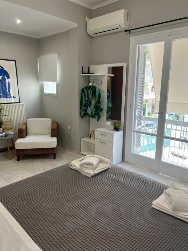 Living near Acropolis by Sylvia Staikou at Nikis str