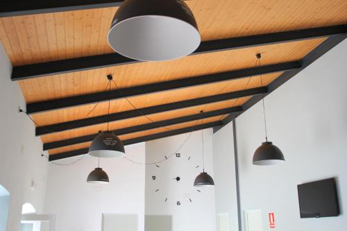 TV a/nebo společenská místnost v ubytování Hostel Cañaveral