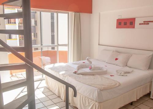 Postel nebo postele na pokoji v ubytování Lagoa Mar Inn - Estacionamento e duas crianças de até 10 anos Será Free