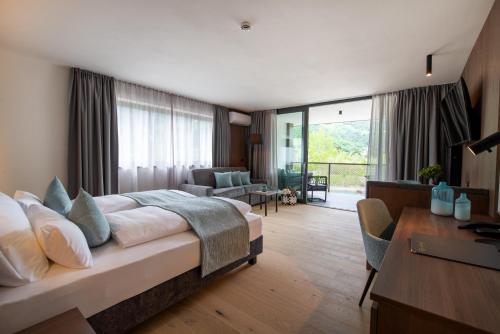 Postel nebo postele na pokoji v ubytování Garden Park Hotel
