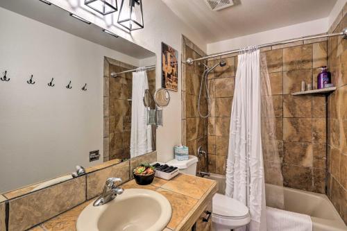 a bathroom with a sink and a toilet and a shower at Grand Junction Townhome about 3 Mi to Downtown! in Grand Junction