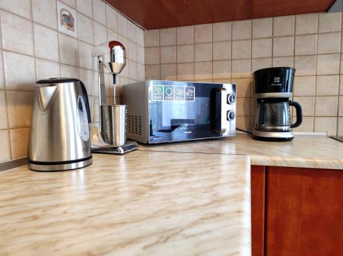 A kitchen or kitchenette at Sea Breeze Apartment
