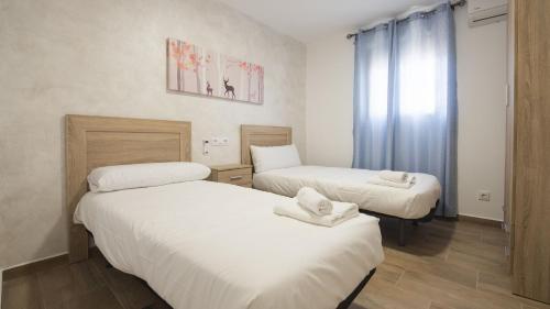 Postel nebo postele na pokoji v ubytování Villa Las Tres Hermanas Albarreal de Tajo by Toledo AP