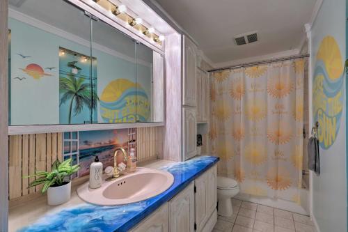 a bathroom with a sink and a shower at Coastal Edgewater Home with Private Hot Tub! in Annapolis