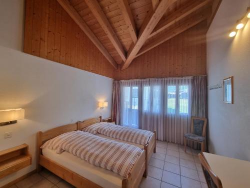Postel nebo postele na pokoji v ubytování Hotel Astoria
