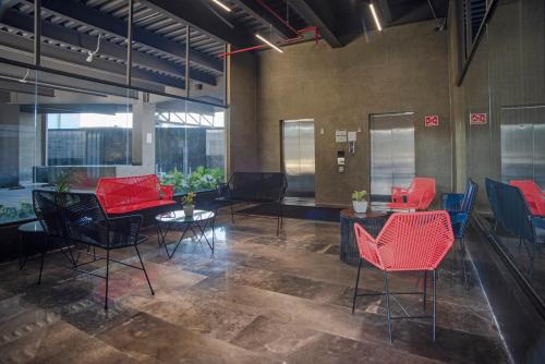 Гостиная зона в Candlewood Suites - Guadalajara Galerias by IHG