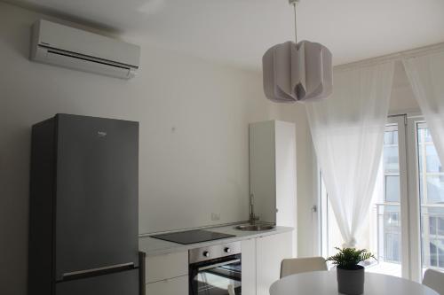 Kuchyň nebo kuchyňský kout v ubytování Virgilio 82 - Penthouse With Terrace