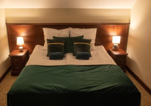 Una cama o camas en una habitación de Forrest style Pokoje gościnne