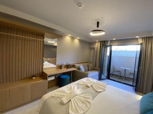 Katil atau katil-katil dalam bilik di Lithos Suites - Nikiti Halkidiki