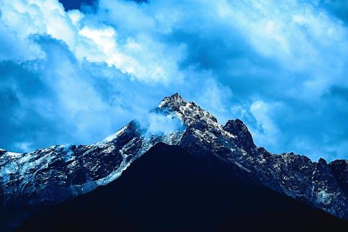 a mountain covered in snow and clouds in the sky at ... mein romantisches Hotel Toalstock in Fiss