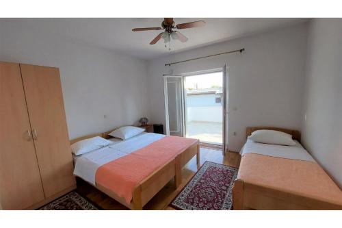 Postel nebo postele na pokoji v ubytování Apartments & Room Masa