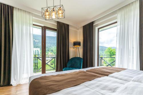 Postel nebo postele na pokoji v ubytování Hotel Chatini Mestia