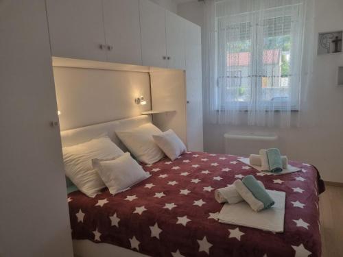 Кровать или кровати в номере Apartman Duje